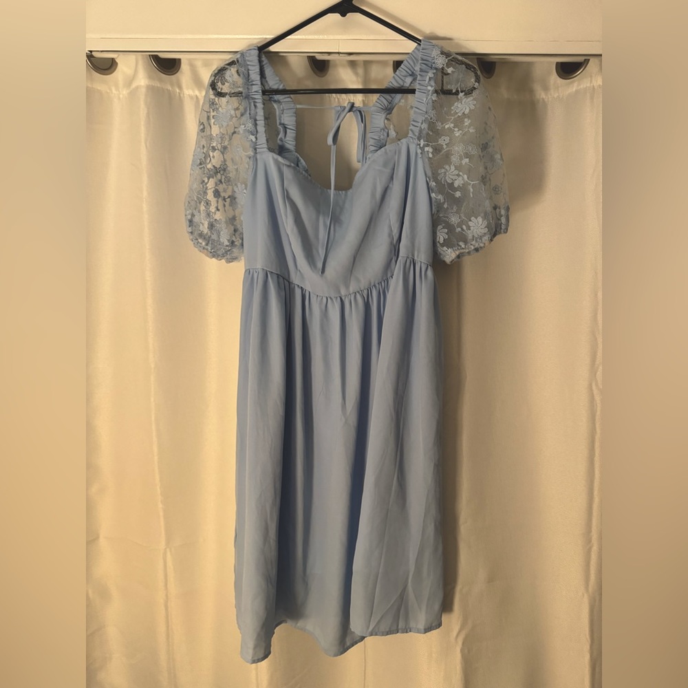 Blue baby doll dress with lace puff sleeves
